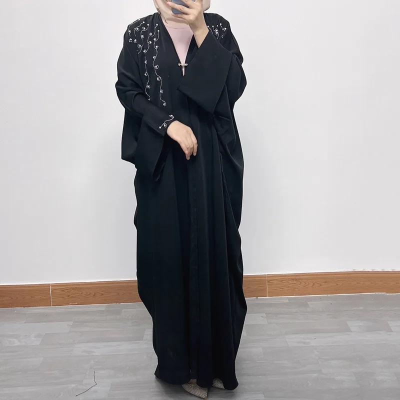 Elegant Abaya With Batwing Sleeves And Pearl Embellishments For Women Dubai Long Loose Maxi Robe long woman shirt
Elegant Abaya With Batwing Sleeves And Pearl Embellishments For Women Dubai Long Loose Maxi Robe long woman shirt