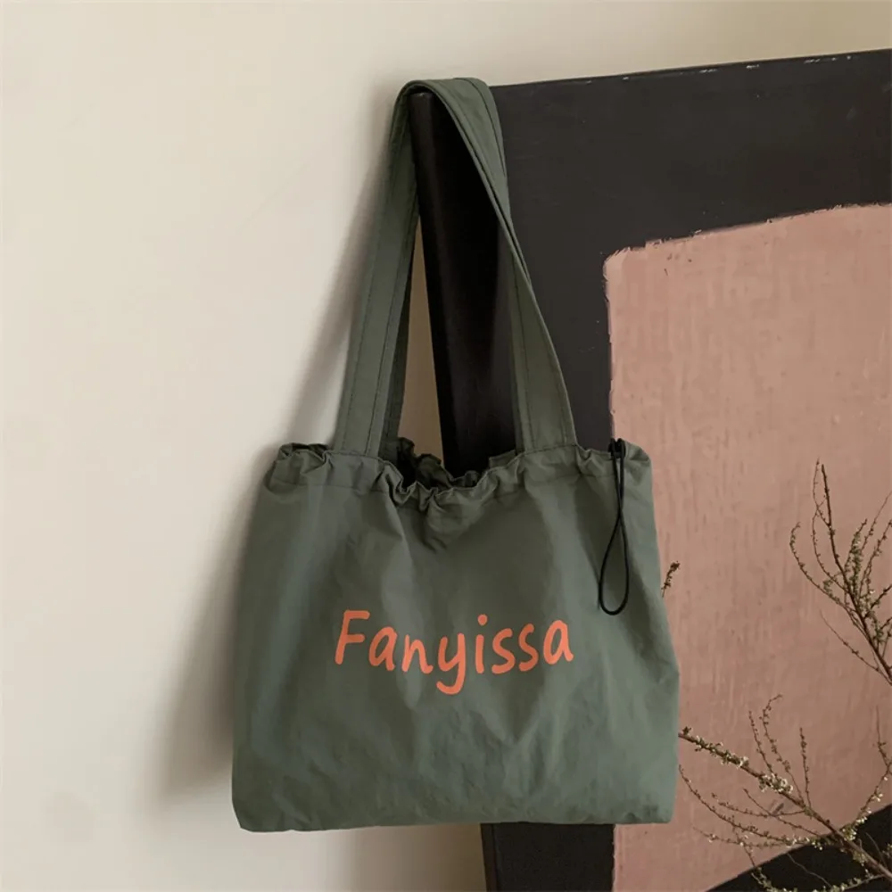 Ins Korean Drawstring Tote Bags Lightweight Casual Shopping Bag Designer Large Capacity Letter Shoulder Bag Outdoor
Ins Korean Drawstring Tote Bags Lightweight Casual Shopping Bag Designer Large Capacity Letter Shoulder Bag Outdoor
