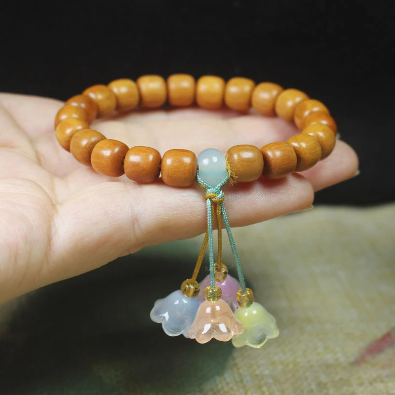 Sandalwood vintage-style beads 8mm bracelet with four-color flower pendant, cultural and religious prayer beads jewelry
Sandalwood vintage-style beads 8mm bracelet with four-color flower pendant, cultural and religious prayer beads jewelry