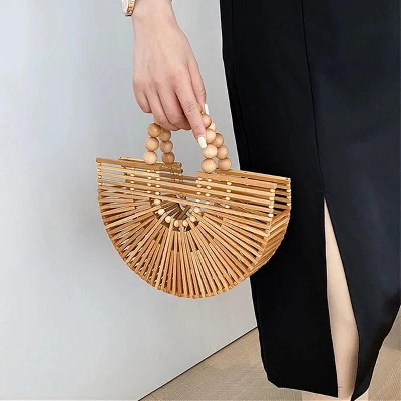 Handmade Fashion Bamboo Handbag Pearl Handle Design Elegant Women Hollow Out Beach Bag Vacation Women Straw Bag Female Bags
Handmade Fashion Bamboo Handbag Pearl Handle Design Elegant Women Hollow Out Beach Bag Vacation Women Straw Bag Female Bags