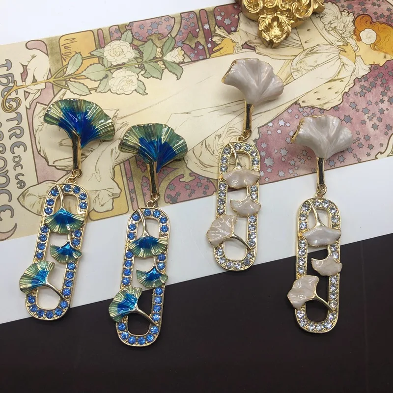 Colorful Enamel Glazed Ginkgo Leaf Shaped Earrings in Europe, America, and the West, Vintage Plated True Gold Inlaid Rhinestone
Colorful Enamel Glazed Ginkgo Leaf Shaped Earrings in Europe, America, and the West, Vintage Plated True Gold Inlaid Rhinestone