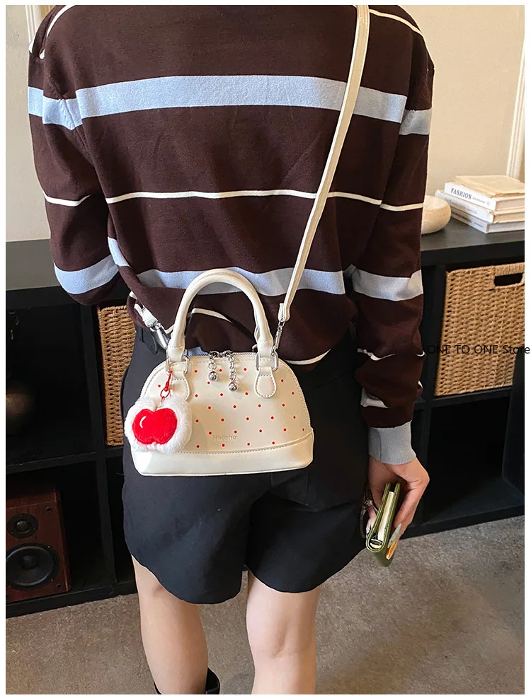 Polka Dot Portable Shell Women's Bag Fashion Niche Light Luxury Mini Foreign Style Version Commuter Children Messenger Bag Tide
Polka Dot Portable Shell Women's Bag Fashion Niche Light Luxury Mini Foreign Style Version Commuter Children Messenger Bag Tide
