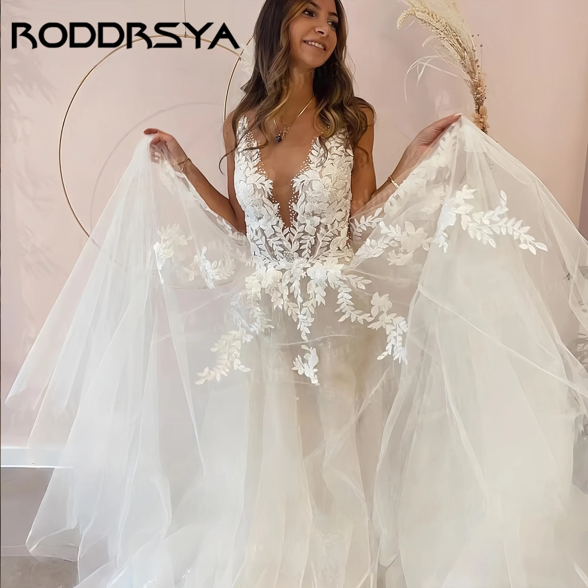 RODDRSYA A-Line Backless Wedding Dress Lace Applique Beaded Off White Tulle Wedding Gowns Trouwjurk Long Bridal Dress Customized
RODDRSYA A-Line Backless Wedding Dress Lace Applique Beaded Off White Tulle Wedding Gowns Trouwjurk Long Bridal Dress Customized