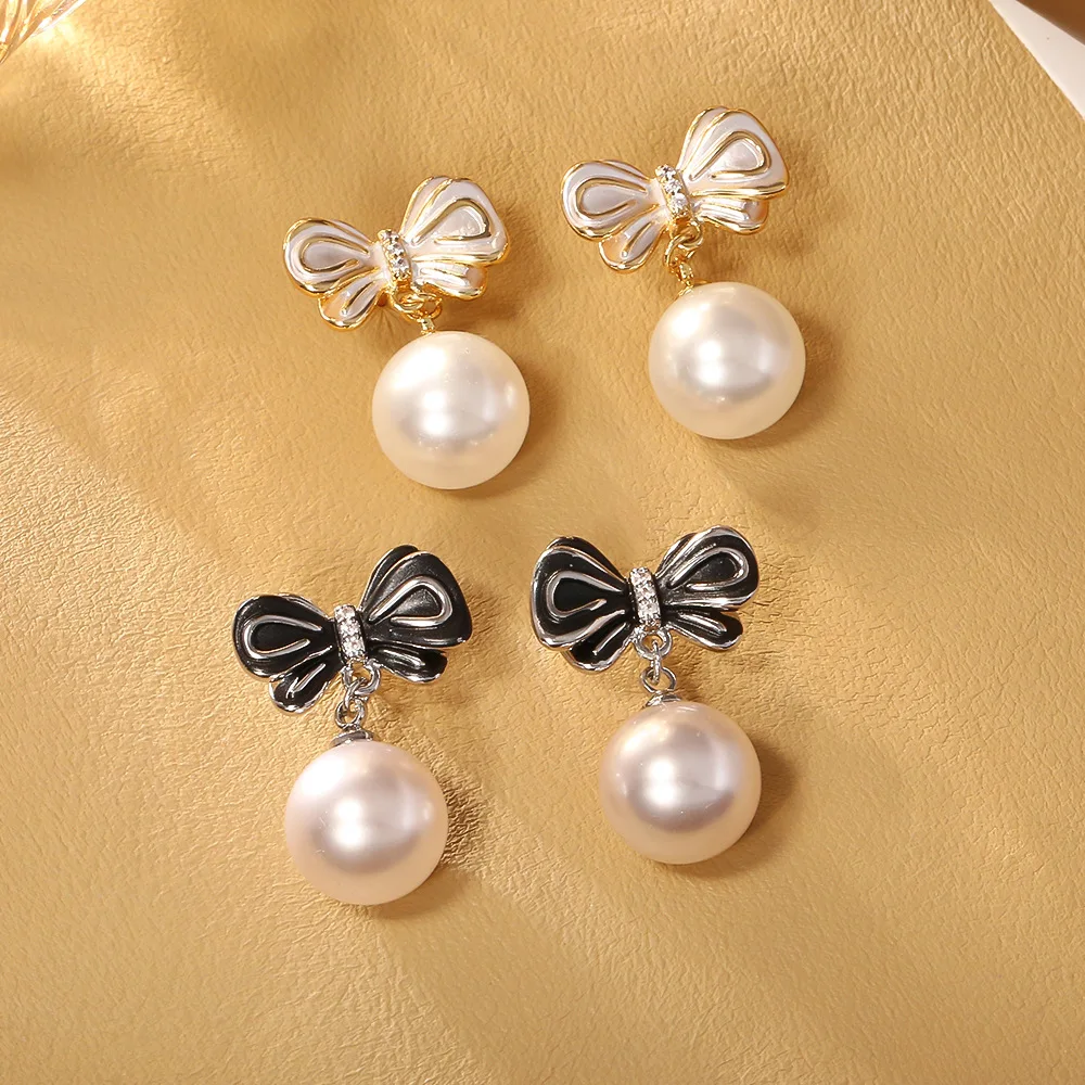 Fashionable and exquisite super fairy bow pearl earrings light luxury niche high-end elegant lady style earrings retro earrings
Fashionable and exquisite super fairy bow pearl earrings light luxury niche high-end elegant lady style earrings retro earrings