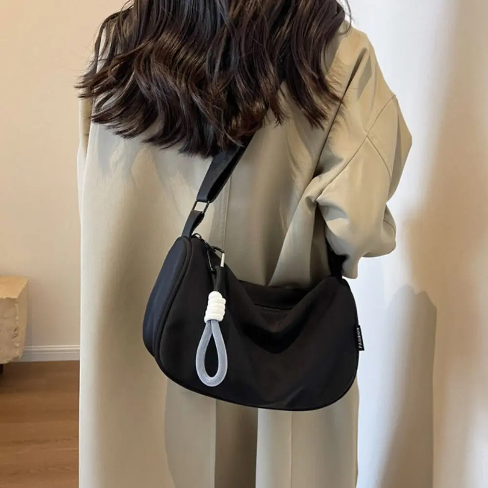 Korean Style Solid Color Hand Bag Dumplings Bag with Short Lanyard Pendant Light Soft Nylon Bag Niche Design Zipper Shoulder Bag
Korean Style Solid Color Hand Bag Dumplings Bag with Short Lanyard Pendant Light Soft Nylon Bag Niche Design Zipper Shoulder Bag