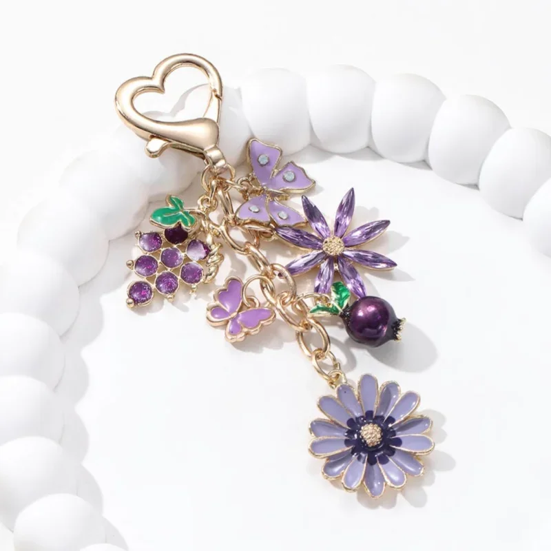 Красивый фиолетовый брелок с цветком, виноградом и бабочкой, эмалевый, в виде растения и фрукта, милые подвески для женщин и мужчин, качественное украшение ручной работы, подарок
Красивый фиолетовый брелок с цветком, виноградом и бабочкой, эмалевый, в виде растения и фрукта, милые подвески для женщин и мужчин, качественное украшение ручной работы, подарок