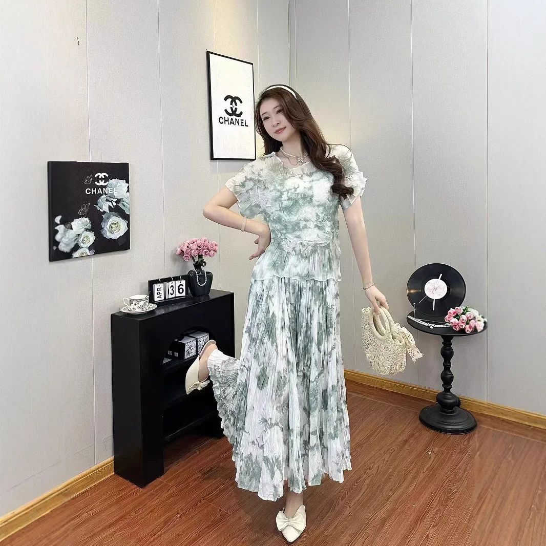 Miyakaya Style Pleated Ink Painting Set for Women 2025 Summer New Comfortable Versatile Top Large Sway Skirt Two-piece Set
Miyakaya Style Pleated Ink Painting Set for Women 2025 Summer New Comfortable Versatile Top Large Sway Skirt Two-piece Set