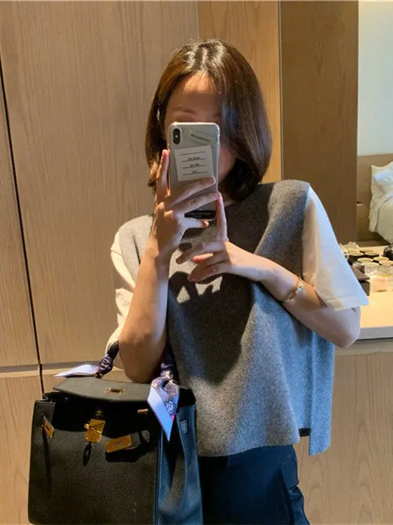 Loose Women's Wool Knitted Vest Spring Autumn Korean Sle Svel Pure Color Knitwear Outerwear Versatile Knitted Sweater
Loose Women's Wool Knitted Vest Spring Autumn Korean Sle Svel Pure Color Knitwear Outerwear Versatile Knitted Sweater