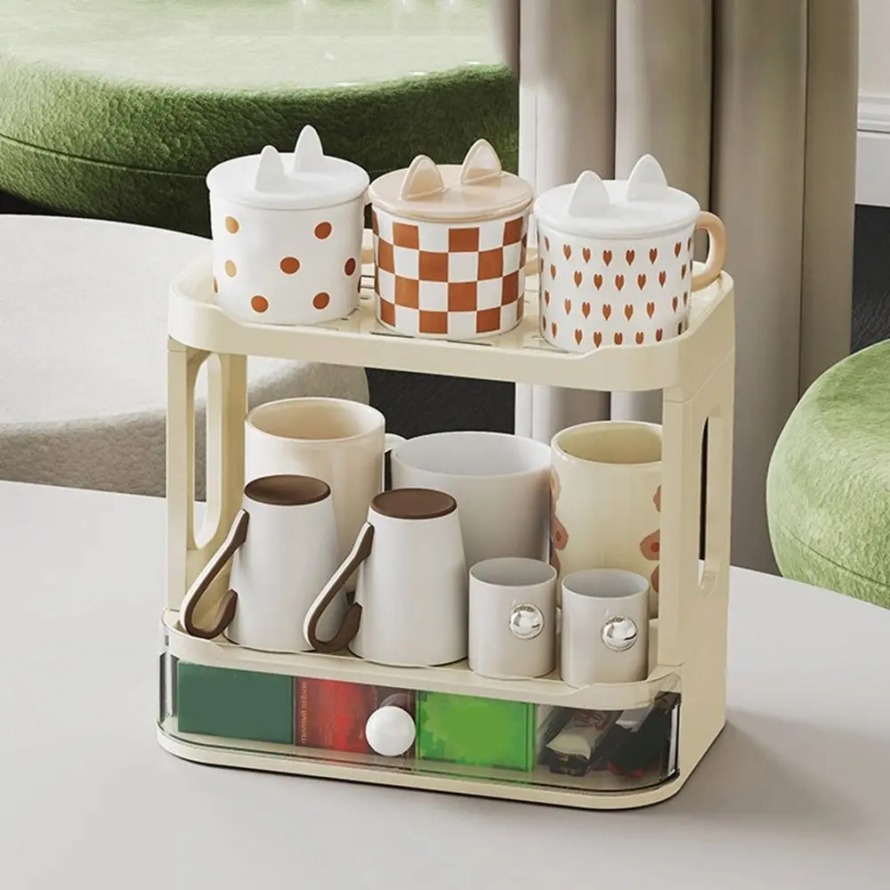 Пластиковая двухслойная полка для хранения чашек, складная с выдвижным ящиком, дренажная полка для чашек, экономия места, держатель для стакана с водой, кухня
Пластиковая двухслойная полка для хранения чашек, складная с выдвижным ящиком, дренажная полка для чашек, экономия места, держатель для стакана с водой, кухня
