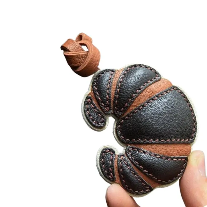 U4LF Elegant Leather Croissant Shaped Bag Charm Stylish Food Pendant Key Ring Handmade Keychain Accessory for Trendsetters
U4LF Elegant Leather Croissant Shaped Bag Charm Stylish Food Pendant Key Ring Handmade Keychain Accessory for Trendsetters