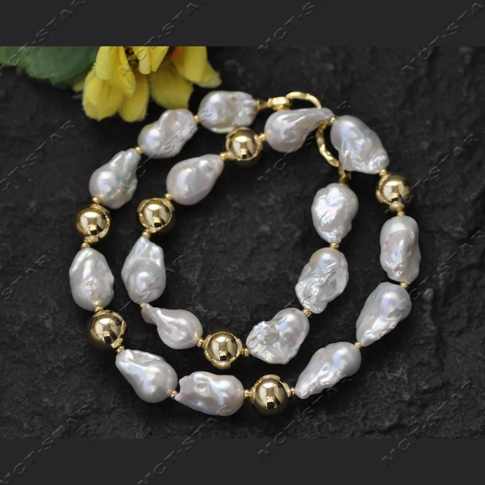 Z14438 23'' 26mm White Baroque Keshi Reborn Pearl Golden Ball Necklace
Z14438 23'' 26mm White Baroque Keshi Reborn Pearl Golden Ball Necklace