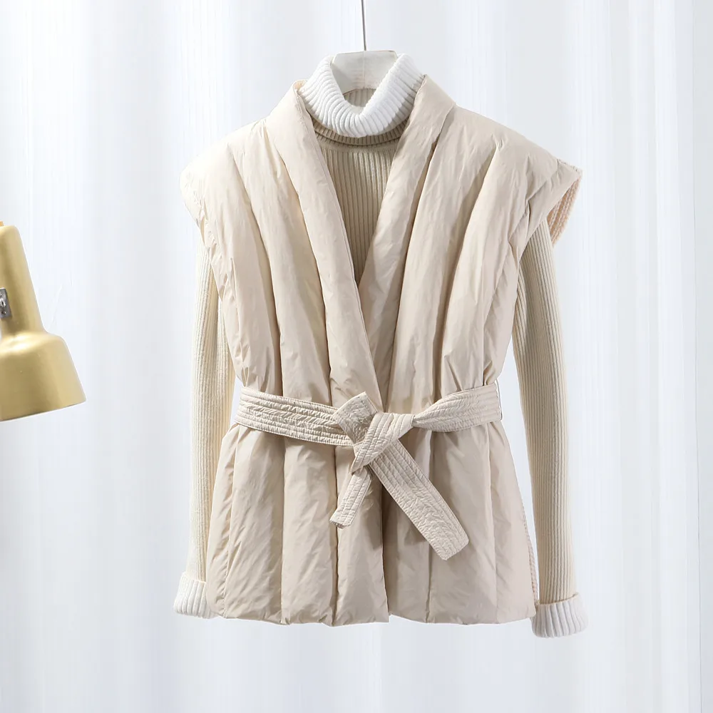 Autumn and Winter V-neck White Down Vest with Belt Loose and Fashionable Knitted Patchwork Sleeveless Jacket
Autumn and Winter V-neck White Down Vest with Belt Loose and Fashionable Knitted Patchwork Sleeveless Jacket