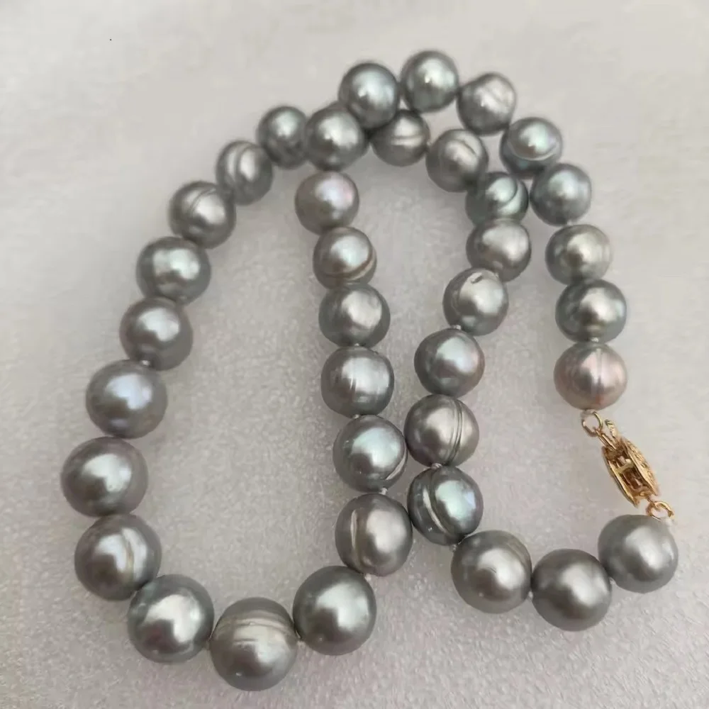 Realistic photo 18 inch beautiful AAA 11-12mm natural South Sea gray Baroque pearl necklace 14k gold
Realistic photo 18 inch beautiful AAA 11-12mm natural South Sea gray Baroque pearl necklace 14k gold
