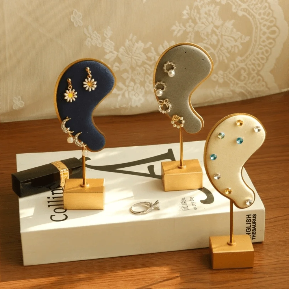 Прочная подставка для серег в форме уха, держатель для серег из микрофибры, подвесная вешалка для серег, высококачественная модель уха, держатель для клипс для ушей, для женщин
Прочная подставка для серег в форме уха, держатель для серег из микрофибры, подвесная вешалка для серег, высококачественная модель уха, держатель для клипс для ушей, для женщин