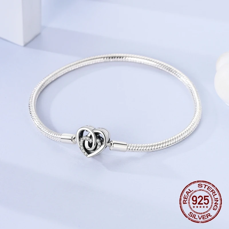 925 Sterling Silver Interlocking Heart Clasp Snake Chain Bracelet Infinity Love Design Fit Charms Jewelry Gift for Women Girls
925 Sterling Silver Interlocking Heart Clasp Snake Chain Bracelet Infinity Love Design Fit Charms Jewelry Gift for Women Girls