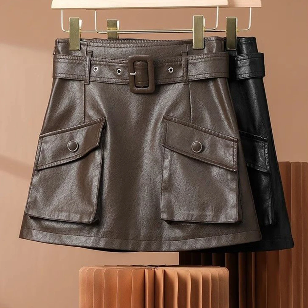 Coffee leather women's 2025 new autumn winter high-waisted A-character belly commuter hip-wrapped short skirt pure desire
Coffee leather women's 2025 new autumn winter high-waisted A-character belly commuter hip-wrapped short skirt pure desire