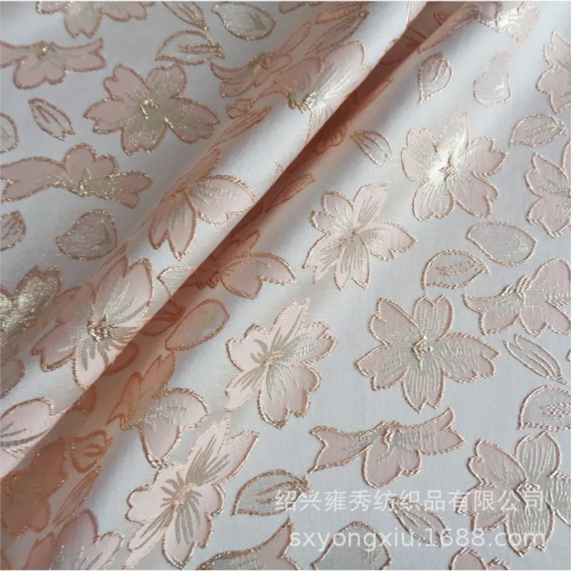 The fabric of jacquard brocade dress with gold thread color and embossed is petal-shaped fashion
The fabric of jacquard brocade dress with gold thread color and embossed is petal-shaped fashion