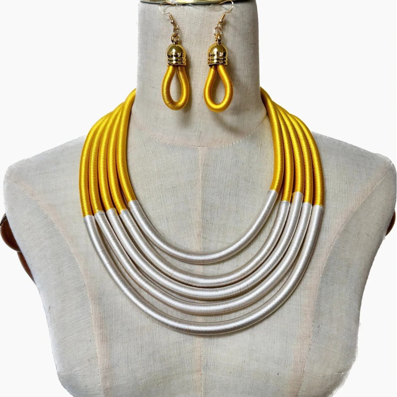 Exaggerated multi-layer woven necklace earrings set hand-wound long magnet buckle shawl chain
Exaggerated multi-layer woven necklace earrings set hand-wound long magnet buckle shawl chain