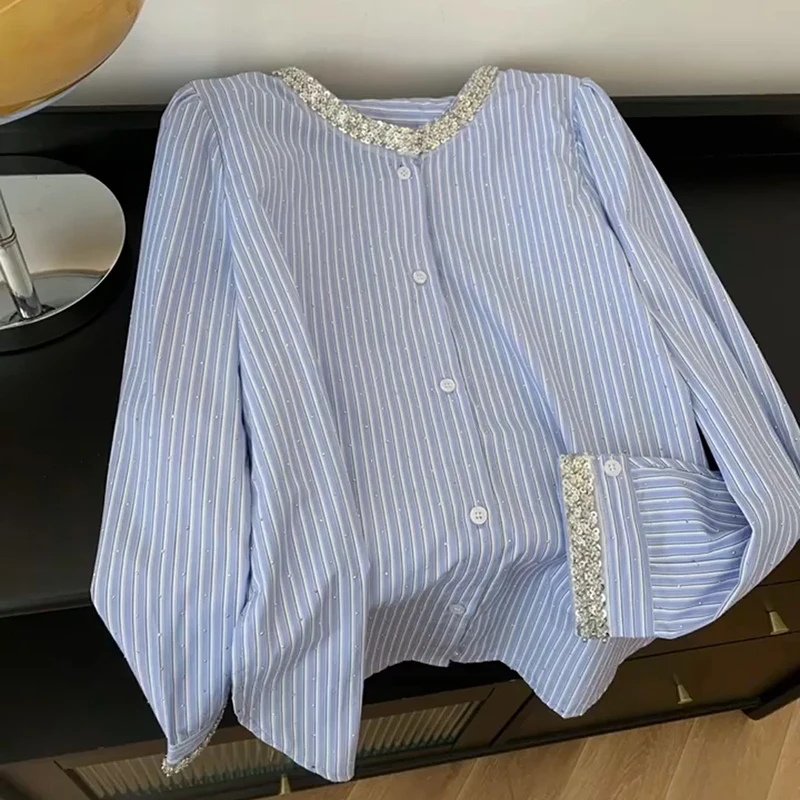 Diamond Studded Blue Striped Shirt Women French Style Loose Sequin O-neck Long Sleeve Blouse Spring Autumn Single Breasted Top 
Diamond Studded Blue Striped Shirt Women French Style Loose Sequin O-neck Long Sleeve Blouse Spring Autumn Single Breasted Top