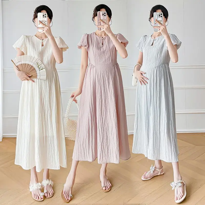 Short Sleeves Maternity Dress for Summer 2024 Puff Sleeve Hollow Out Collar Long Loose Pregnant Woman Pleated Dress Solid Color
Short Sleeves Maternity Dress for Summer 2024 Puff Sleeve Hollow Out Collar Long Loose Pregnant Woman Pleated Dress Solid Color