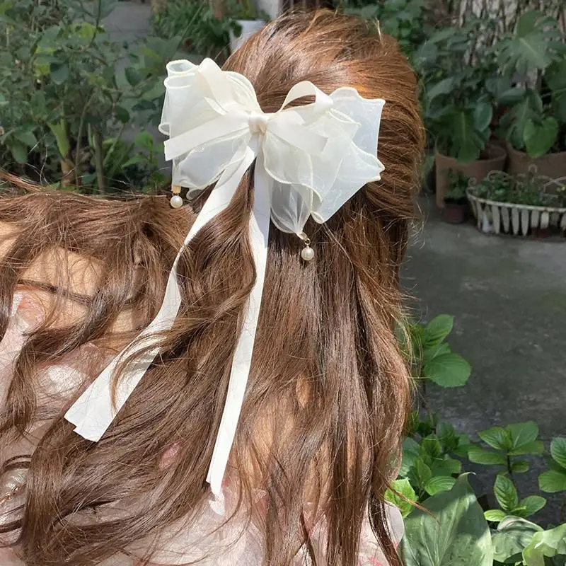 2025 Summer Sweet Bow Hair Clip For Girls Long Ribbon Bow Hairclip For Women White Bowknot Barrettes Pearl Hairpin Headwear
2025 Summer Sweet Bow Hair Clip For Girls Long Ribbon Bow Hairclip For Women White Bowknot Barrettes Pearl Hairpin Headwear