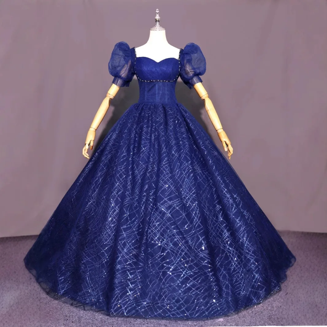 Sparking Puff Short Sleeves Evening Dresses Beading Party Gown Floor-Length Customized Navy Blue Prom Dress 2025 robes de soirée
Sparking Puff Short Sleeves Evening Dresses Beading Party Gown Floor-Length Customized Navy Blue Prom Dress 2025 robes de soirée