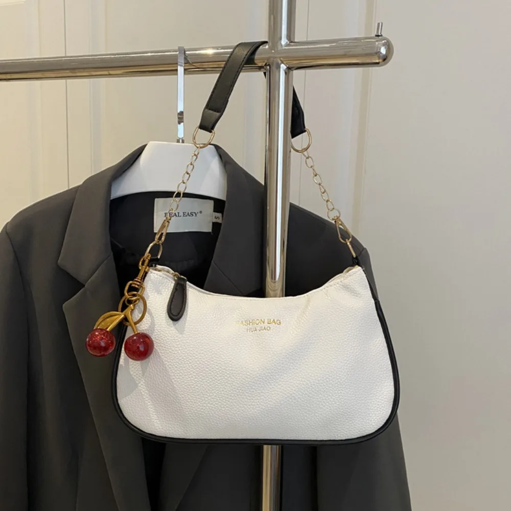 PU Leather Underarm Bag Zipper Closure With Cherry Pendant Shoulder Bag Adjustable Strap Handbag For Ladies and Girls
PU Leather Underarm Bag Zipper Closure With Cherry Pendant Shoulder Bag Adjustable Strap Handbag For Ladies and Girls