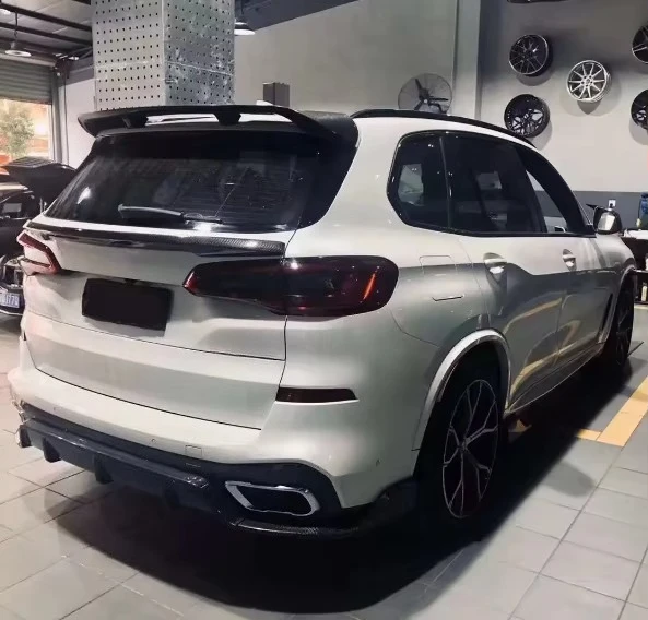 STLF Tuning to Black Samurai Carbon Fiber Auto Parts for BMWs X5 G05 Body Kit Front Rear Lip Side Skirts Grille Top Wing Spoiler
STLF Tuning to Black Samurai Carbon Fiber Auto Parts for BMWs X5 G05 Body Kit Front Rear Lip Side Skirts Grille Top Wing Spoiler