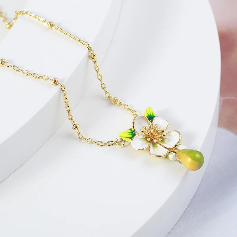 Trendy Luxury Hand-painted Enamel Glaze Pastoral Style Green Yellow Pear Blossom Fruit Pendant Sweet Forest Necklace for Women
Trendy Luxury Hand-painted Enamel Glaze Pastoral Style Green Yellow Pear Blossom Fruit Pendant Sweet Forest Necklace for Women