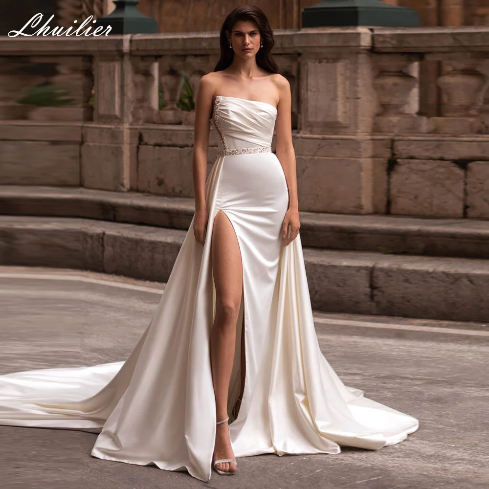 Lhuilier Customized A Line Beaded Strapless Satin Wedding Dresses High Slit Bridal Gowns with Chapel Train
Lhuilier Customized A Line Beaded Strapless Satin Wedding Dresses High Slit Bridal Gowns with Chapel Train