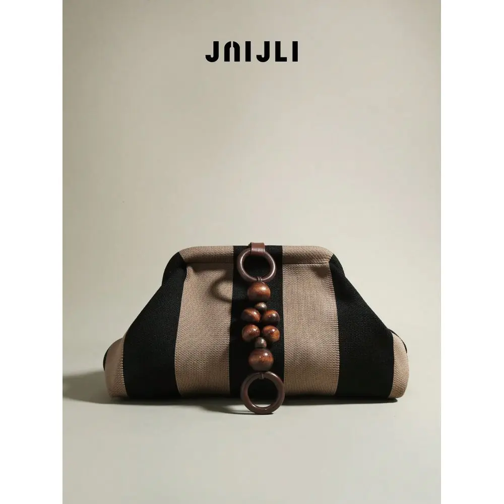 JLI Beige Black Striped Clutch Purse With Wooden Bead Ring Detail Women Stylish Handbag Cross Body Bag Travel Essential Casual
JLI Beige Black Striped Clutch Purse With Wooden Bead Ring Detail Women Stylish Handbag Cross Body Bag Travel Essential Casual