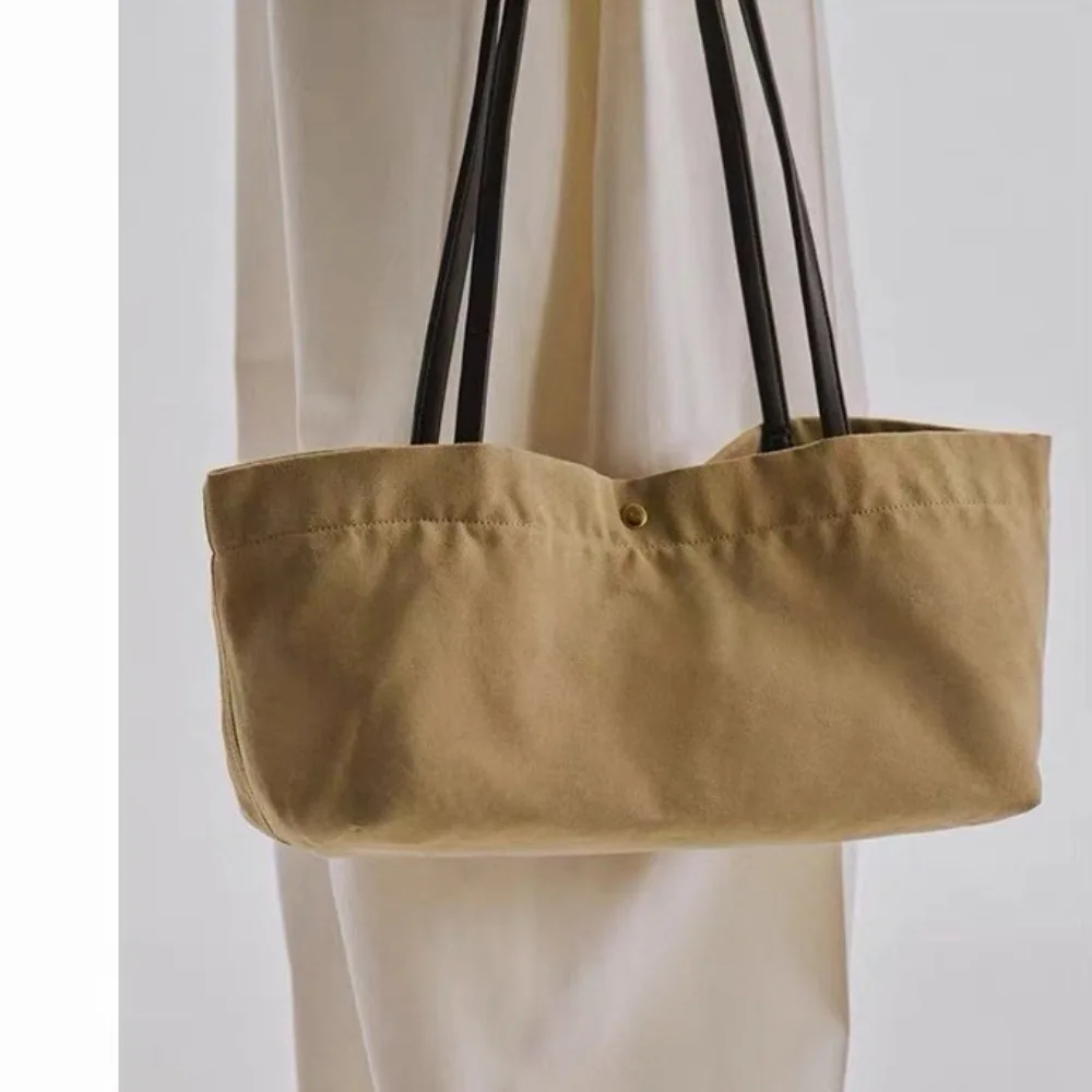 Canvas Female New Student Large-capacity Handbag Shoulder Shopping Bag Simple Premium Tote with Unique and Fashionable Texture
Canvas Female New Student Large-capacity Handbag Shoulder Shopping Bag Simple Premium Tote with Unique and Fashionable Texture