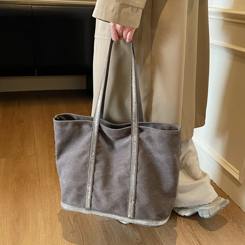 Весенняя вместительная сумка-тоут из плотного холста для женщин, 2026, хит продаж, с яркими стразами, стильный дизайн, повседневная
Весенняя вместительная сумка-тоут из плотного холста для женщин, 2026, хит продаж, с яркими стразами, стильный дизайн, повседневная