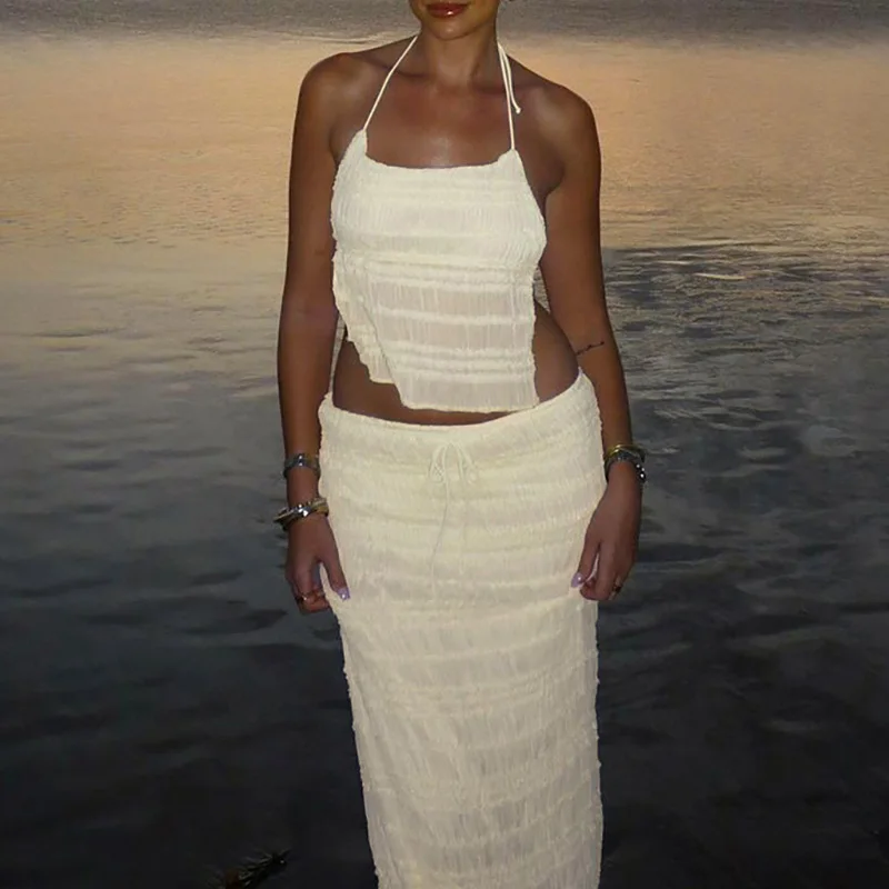Casual Backless Solid Holiday Outfits Sexy Halter Sleeveless Top and Long Skirt Suit Summer Hollow Pleated Slim Two Piece Sets
Casual Backless Solid Holiday Outfits Sexy Halter Sleeveless Top and Long Skirt Suit Summer Hollow Pleated Slim Two Piece Sets