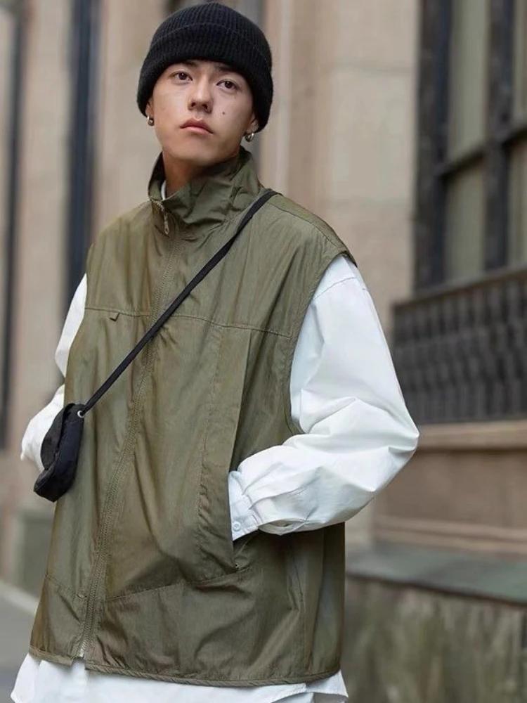 Breathable Men's Outdoor Vest Quick Dry Casual Jacket with Standing Collar Unisex Loose Fit Cargo Style for Spring Autumn
Breathable Men's Outdoor Vest Quick Dry Casual Jacket with Standing Collar Unisex Loose Fit Cargo Style for Spring Autumn