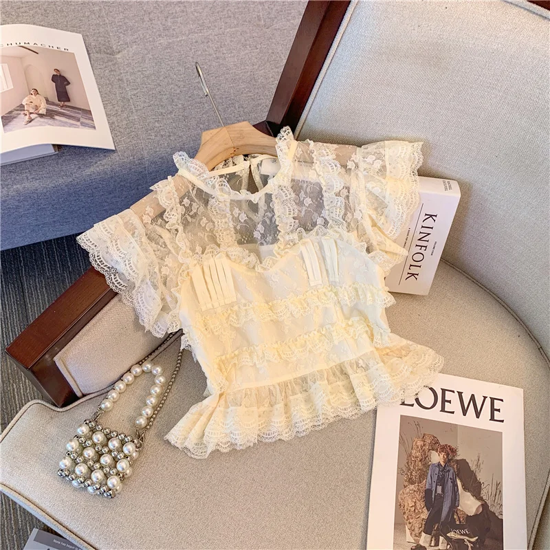 Gothiscyn O-neck Lace Patchwork Shirt Women's Summer Flying Sleeves Slim Fit Ruffle Edge Short Blouse Fashion Female Clothes
Gothiscyn O-neck Lace Patchwork Shirt Women's Summer Flying Sleeves Slim Fit Ruffle Edge Short Blouse Fashion Female Clothes