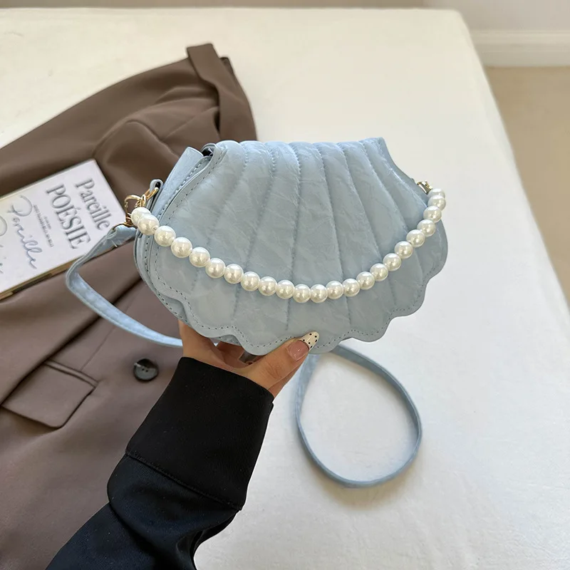 2026 Spring New Bag Women's Korean Style Western Shoulder Bag Fashion Simple Leisure Bag Niche Simple Shell Bag
2026 Spring New Bag Women's Korean Style Western Shoulder Bag Fashion Simple Leisure Bag Niche Simple Shell Bag