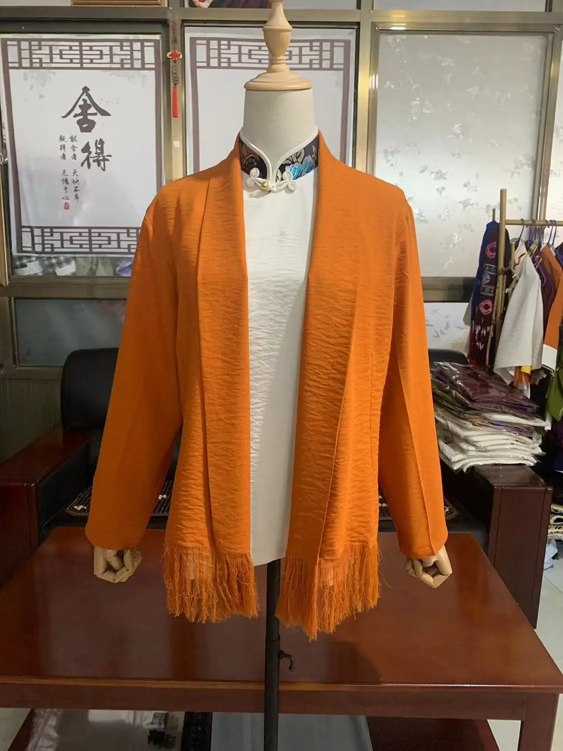 Women's single-layer spring and autumn cardigan fringed outerwear Tibetan clothing
Women's single-layer spring and autumn cardigan fringed outerwear Tibetan clothing
