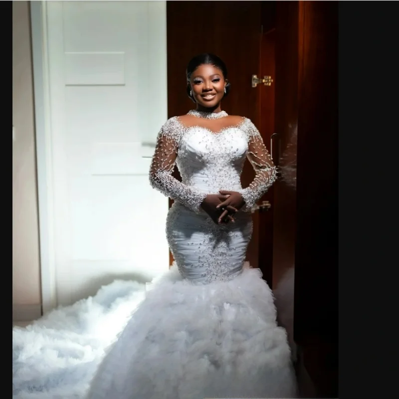 Customized Sheer Neck Handwork Heavy Beads Pearls Mermaid Wedding Dress Robe De Mariée Long Sleeves Tiers Tulle Bridal Gown
Customized Sheer Neck Handwork Heavy Beads Pearls Mermaid Wedding Dress Robe De Mariée Long Sleeves Tiers Tulle Bridal Gown