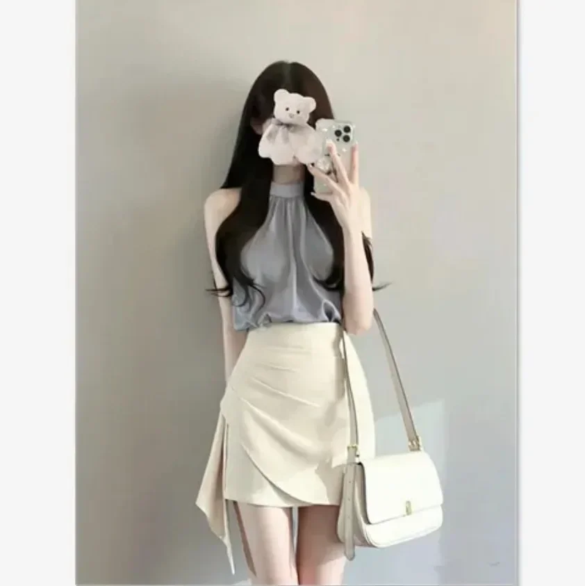 2025 Новый летний комплект с высокой талией и подвесным женским жилетом, стильный топ без рукавов и юбка, женский ансамбль 
2025 Новый летний комплект с высокой талией и подвесным женским жилетом, стильный топ без рукавов и юбка, женский ансамбль