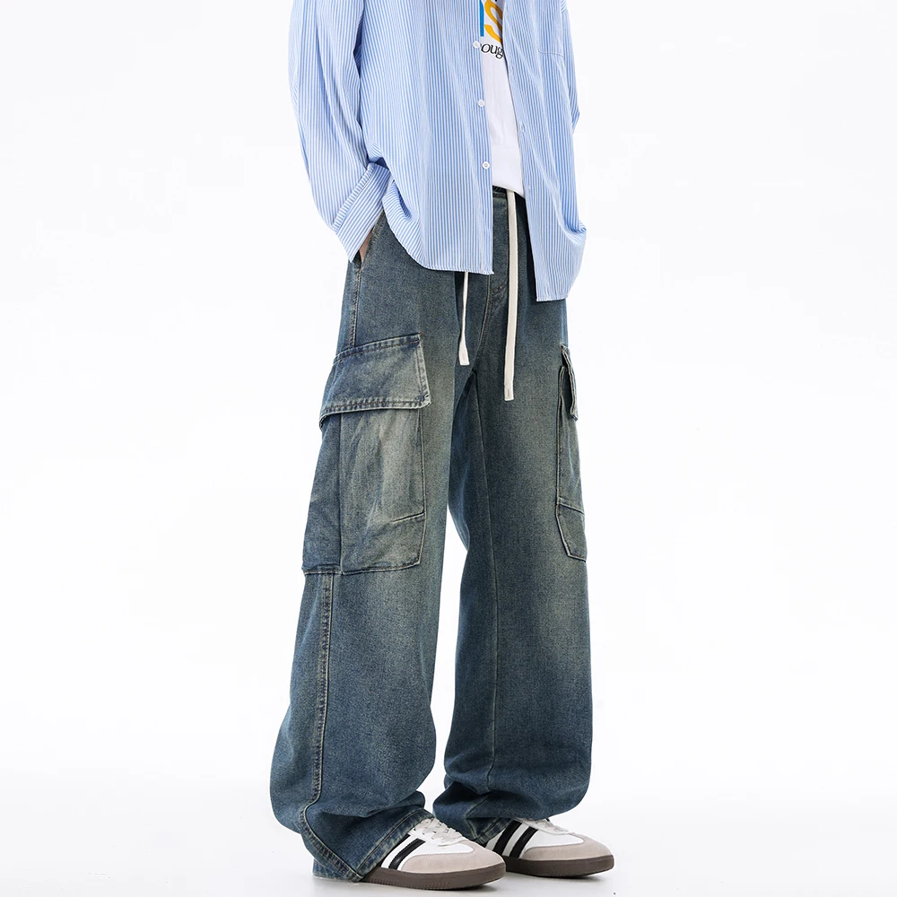 Джинсы-карго, мужская рабочая одежда, стильные брюки с заниженной промежностью, свободные брюки с завязками на талии, модные брюки с большим боковым карманом, брюки в стиле хип-хоп 
Джинсы-карго, мужская рабочая одежда, стильные брюки с заниженной промежностью, свободные брюки с завязками на талии, модные брюки с большим боковым карманом, брюки в стиле хип-хоп