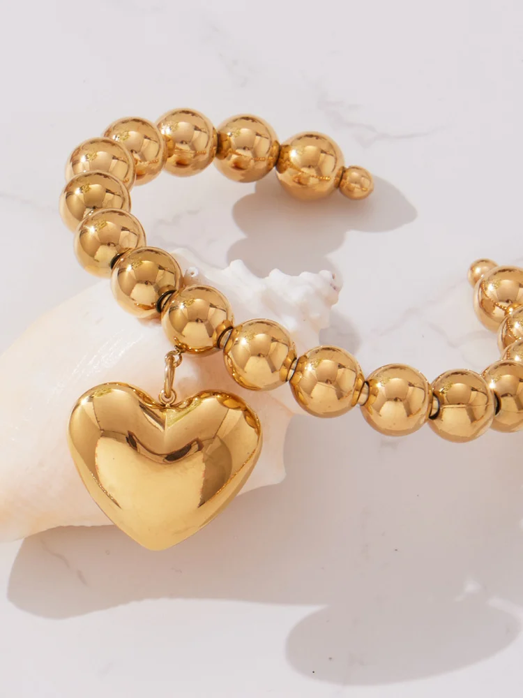 Браслет из титановой стали с крупными круглыми бусинами и золотистым сердечком, гладкий, с подвеской в форме сердца, женские роскошные украшения для рук, модные аксессуары
Браслет из титановой стали с крупными круглыми бусинами и золотистым сердечком, гладкий, с подвеской в форме сердца, женские роскошные украшения для рук, модные аксессуары