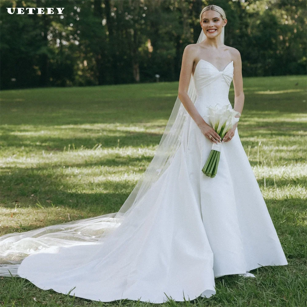 UETEEY Customized Simple Strapless Pleats Sleeveless Wedding Dress Women Crepe A Line Zipper Back Floor Length Bridal Gown
UETEEY Customized Simple Strapless Pleats Sleeveless Wedding Dress Women Crepe A Line Zipper Back Floor Length Bridal Gown