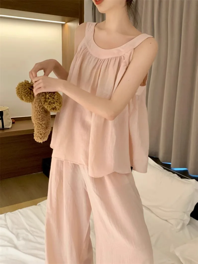 Summer Women's Pajama Set 2025 New Solid Color Strap Tops Casual Straight Pants 2Pcs Female Nightgown Korean Thin Home Clothes
Summer Women's Pajama Set 2025 New Solid Color Strap Tops Casual Straight Pants 2Pcs Female Nightgown Korean Thin Home Clothes