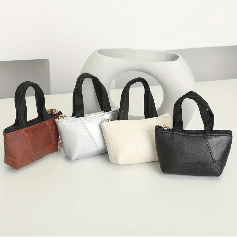 Модная сумка-ключница из искусственной кожи с стеганым узором и тиснением, суперминиатюрная маленькая сумочка для хранения мелочи
Модная сумка-ключница из искусственной кожи с стеганым узором и тиснением, суперминиатюрная маленькая сумочка для хранения мелочи