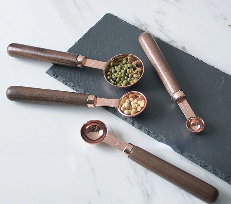 4pcs/set Rose Gold Stainless Steel Wood Handle Measuring Spoons Tea Coffee Scoops Baking Tools
4pcs/set Rose Gold Stainless Steel Wood Handle Measuring Spoons Tea Coffee Scoops Baking Tools