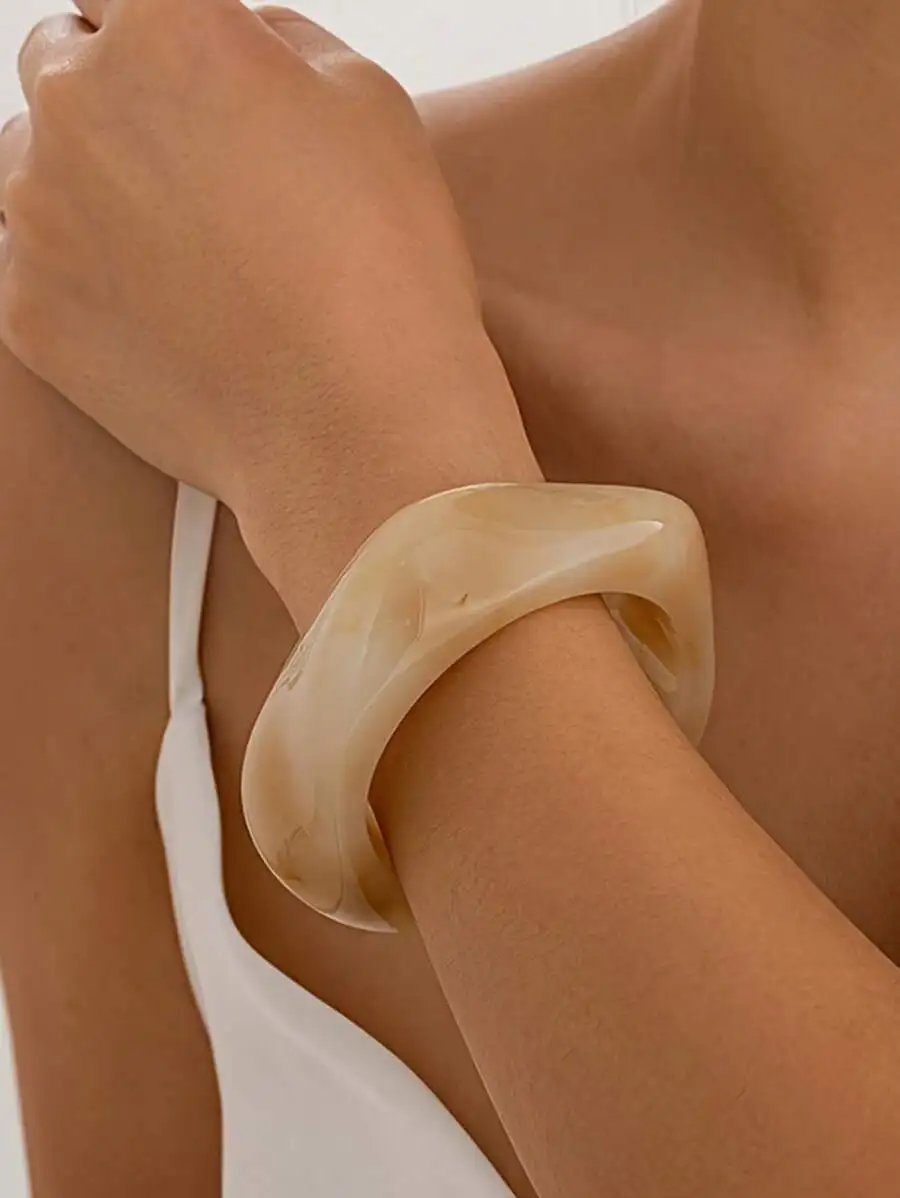 Sleek Asymmetrical Semi-Transparent Acrylic Cuff In Soft Cream With Fluid Organic Shape For Modern Minimalist Styling
Sleek Asymmetrical Semi-Transparent Acrylic Cuff In Soft Cream With Fluid Organic Shape For Modern Minimalist Styling