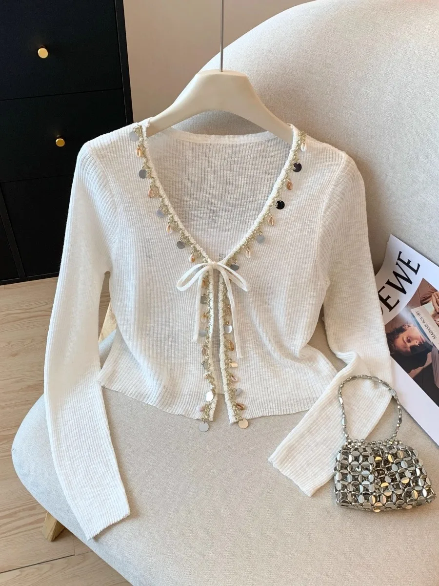 n Ice Silk Women's Thin Strap Knitted Cardigan French Sle Polyester Fiber Summer Air Conditioning Top Outerwear
n Ice Silk Women's Thin Strap Knitted Cardigan French Sle Polyester Fiber Summer Air Conditioning Top Outerwear