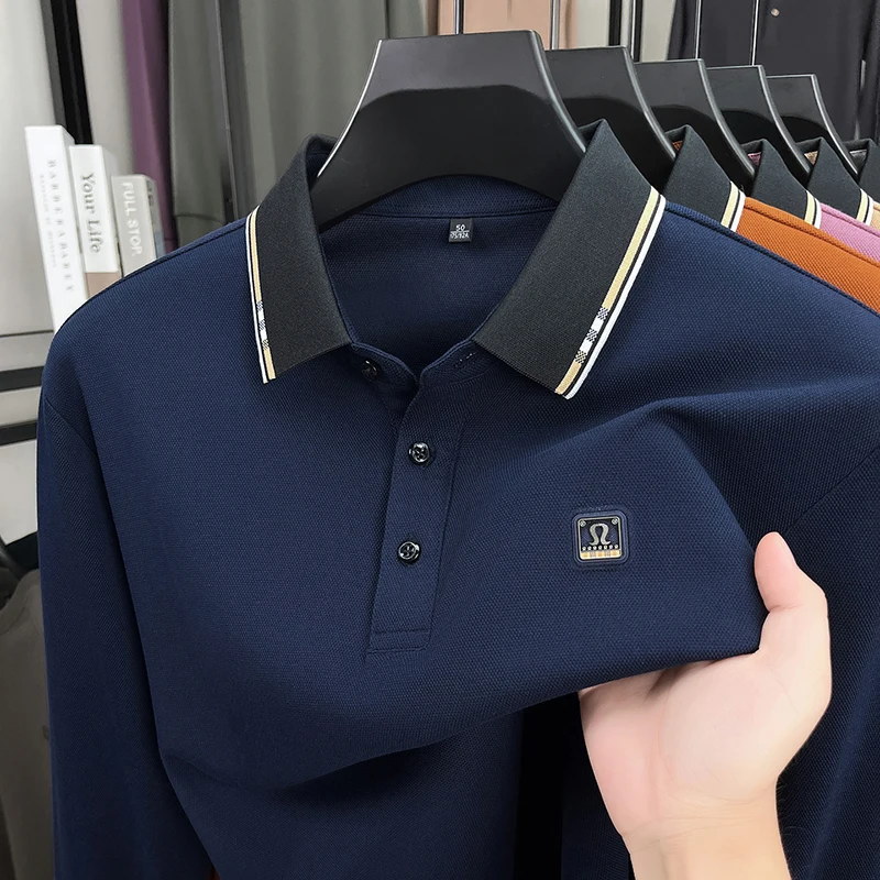 Роскошные бренды Буквы тиснением длинными рукавами Поло рубашка весна осень комфорт досуг футболка Высокий уровень модный перевернутый воротник мужская одежда
Роскошные бренды Буквы тиснением длинными рукавами Поло рубашка весна осень комфорт досуг футболка Высокий уровень модный перевернутый воротник мужская одежда