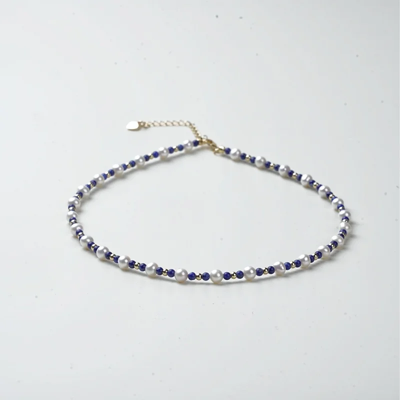 natural freshwater pearl necklace paired with lapis lazuli charms jewelry gift for women
natural freshwater pearl necklace paired with lapis lazuli charms jewelry gift for women